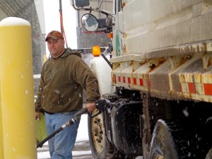 Chad Dial of Holmes County in Ohio is refueling an Ohio Department of Transportation snowplow during a winter event in February 2013. He is one of the many at ODOT who work around the clock in cold weather to keep Ohio highways safe during the snow and ice season.